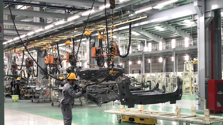 Một số doanh nghiệp Việt Nam đẩy mạnh chuyển giao công nghệ, sản xuất các sản phẩm với hàm lượng giá trị gia tăng nội địa ngày càng cao. Ảnh: QH
