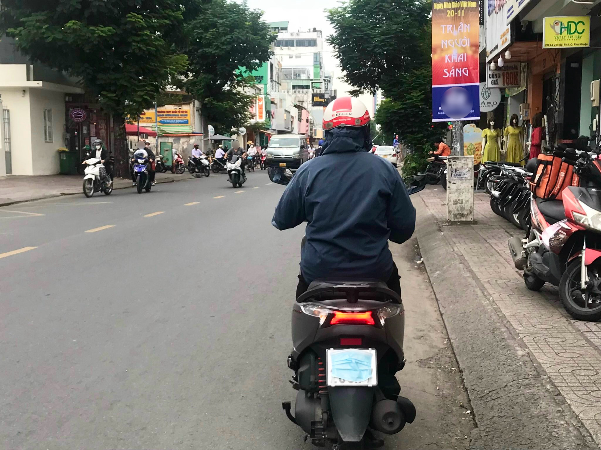 Che biển số xe khi tham gia giao thông là vi phạm pháp luật. Ảnh minh hoạ. Ảnh: TRẦN MINH. che biển số