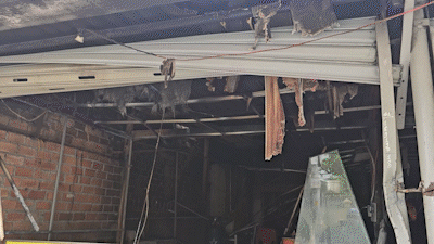 Cháy quán cơm gà, cảnh sát xông vào đám lửa cứu 2 người