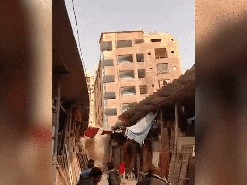 Dân bỏ chạy tán loạn khi tòa nhà bỗng dưng đổ sập