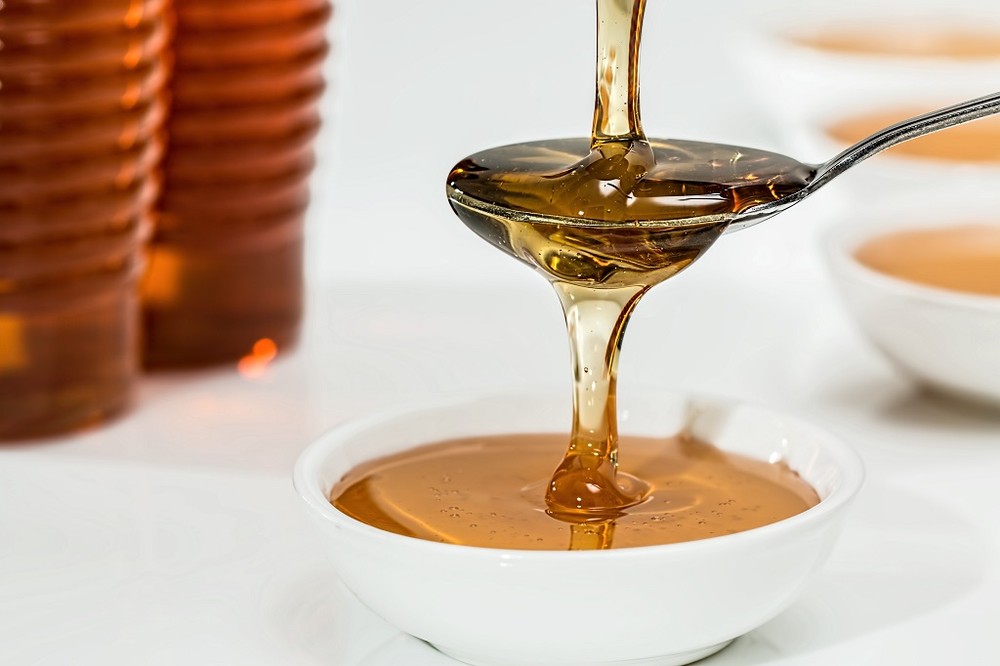Mật ong thường được sử dụng làm chất tạo ngọt và mang lại nhiều lợi ích cho sức khỏe .Ảnh: Pexels