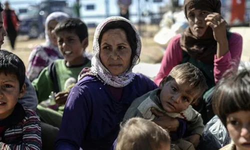 Dưới sự cai quản của IS, phụ nữ và trẻ em trở thành những món hàng sống, bị gắn thẻ giá và bán lại trên một thị trường riêng biệt. Ảnh: AFP 456446172-10-2-lynch-5372-1412312249.jpg