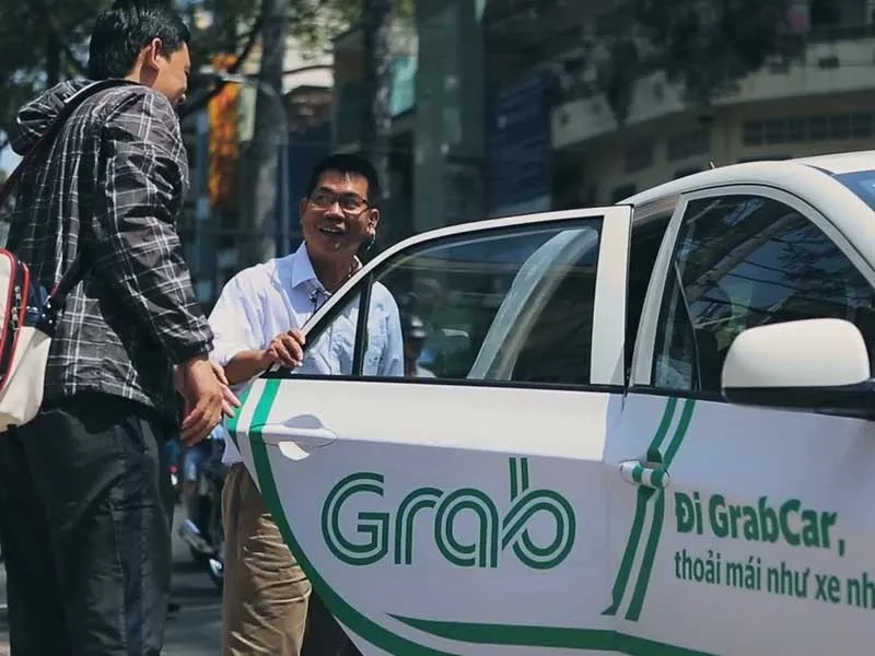 Công tác quản lý vận tải đối với hoạt động của Grab tại Đà Nẵng hiện có hai quan điểm khác nhau. Ảnh: PLO