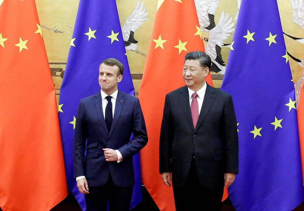 Tổng thống Pháp Emmanuel Macron (trái) và Chủ tịch Trung Quốc Tập Cận Bình. Ảnh: Jason Lee/REUTERS Tổng thống Pháp Emmanuel Macron (trái) và Chủ tịch Trung Quốc Tập Cận Bình. Ảnh: Jason Lee/REUTERS