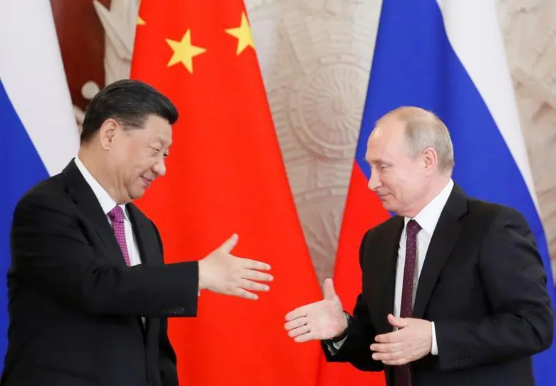 Chủ tịch Trung Quốc Tập Cận Bình (trái) và Tổng thống Nga Vladimir Putin. Ảnh: REUTERS