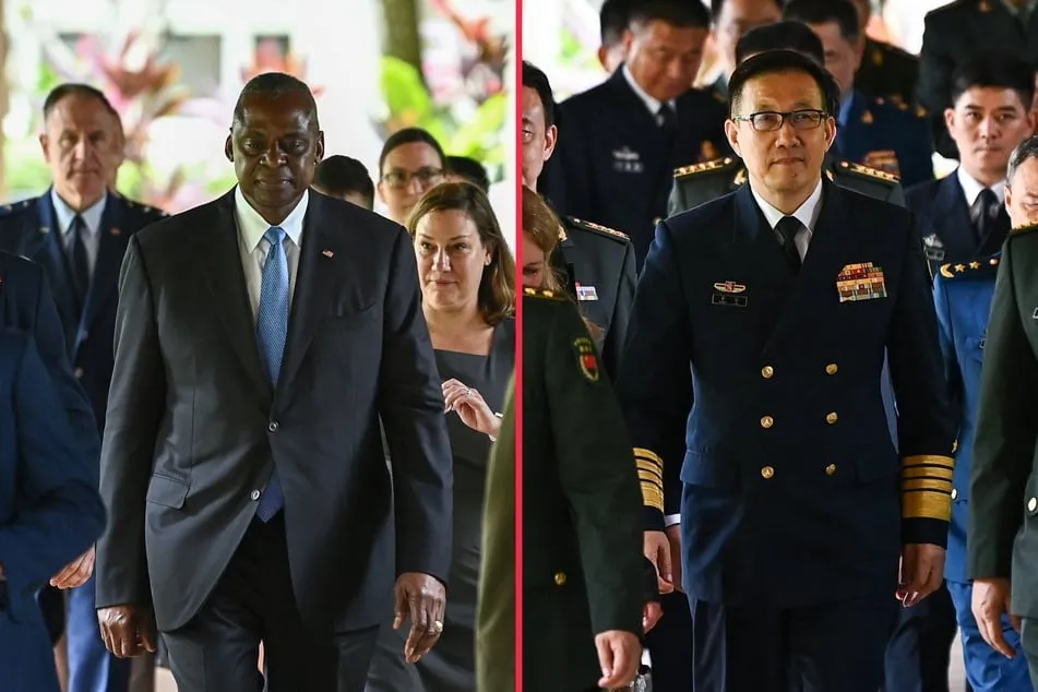 Bộ trưởng Quốc phòng Mỹ Lloyd Austin gặp Bộ trưởng Quốc phòng Trung Quốc Đổng Quân tại Đối thoại Shangri-La 2024. Ảnh: AFP hps0yu0jbbj3xz33gw3gdznltw2bvuli.jpg