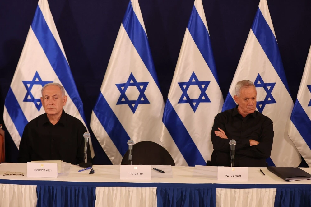 Thủ tướng Israel Benjamin Netanyahu (trái) và ông Benny Gantz. Ảnh: AFP/GETTY IMAGES nội các chiến tranh Israel