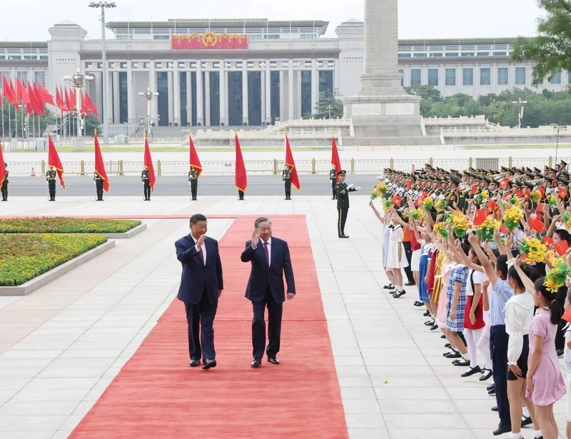 Tổng Bí thư, Chủ tịch nước Tô Lâm và Tổng Bí thư, Chủ tịch nước Trung Quốc Tập Cận Bình tại lễ đón Tổng Bí thư, Chủ tịch nước Tô Lâm và Phu nhân thăm cấp Nhà nước tới Trung Quốc hồi tháng 8-2024. Ảnh: TTXVN Chủ tịch Trung Quốc Tập Cận Bình thăm Việt Nam.jpg