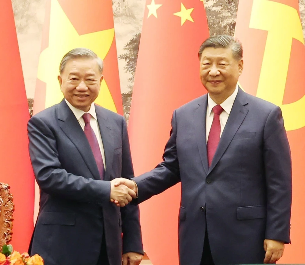 Tổng Bí thư, Chủ tịch nước Tô Lâm và Tổng Bí thư, Chủ tịch Trung Quốc Tập Cận Bình hồi tháng 8-2024. Ảnh: TTXVN vna_potal_tong_bi_thu_chu_tich_n.jpg