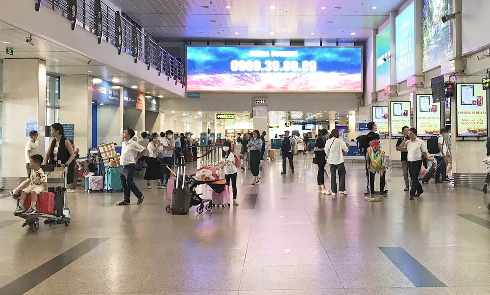 Ga quốc nội sân bay Tân Sơn Nhất thông thoáng vào chiều 30-8. san-bay (9).jpg