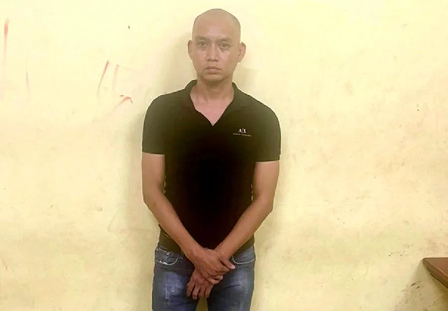 Lê Thanh Hiếu tại cơ quan công an. Ảnh CA.