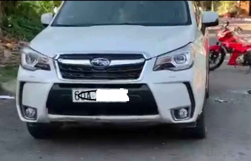 Nạn nhân được phát hiện trên xe ô tô. Ảnh: VH. Nạn nhân được phát hiện trên xe ô tô. Ảnh: VH.