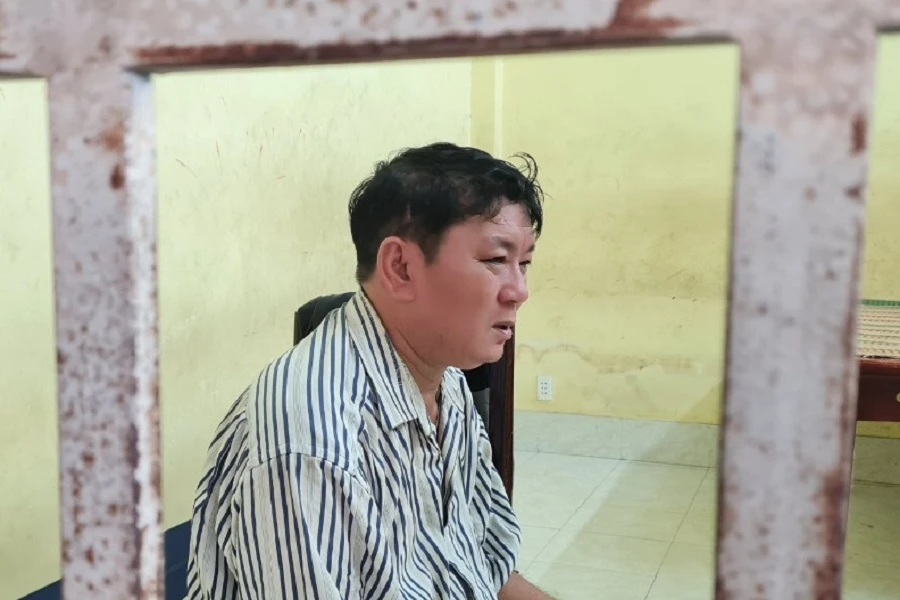Bị can Phạm Ngọc Vinh khi bị bắt. Ảnh: VŨ HỘI vé số.jpg