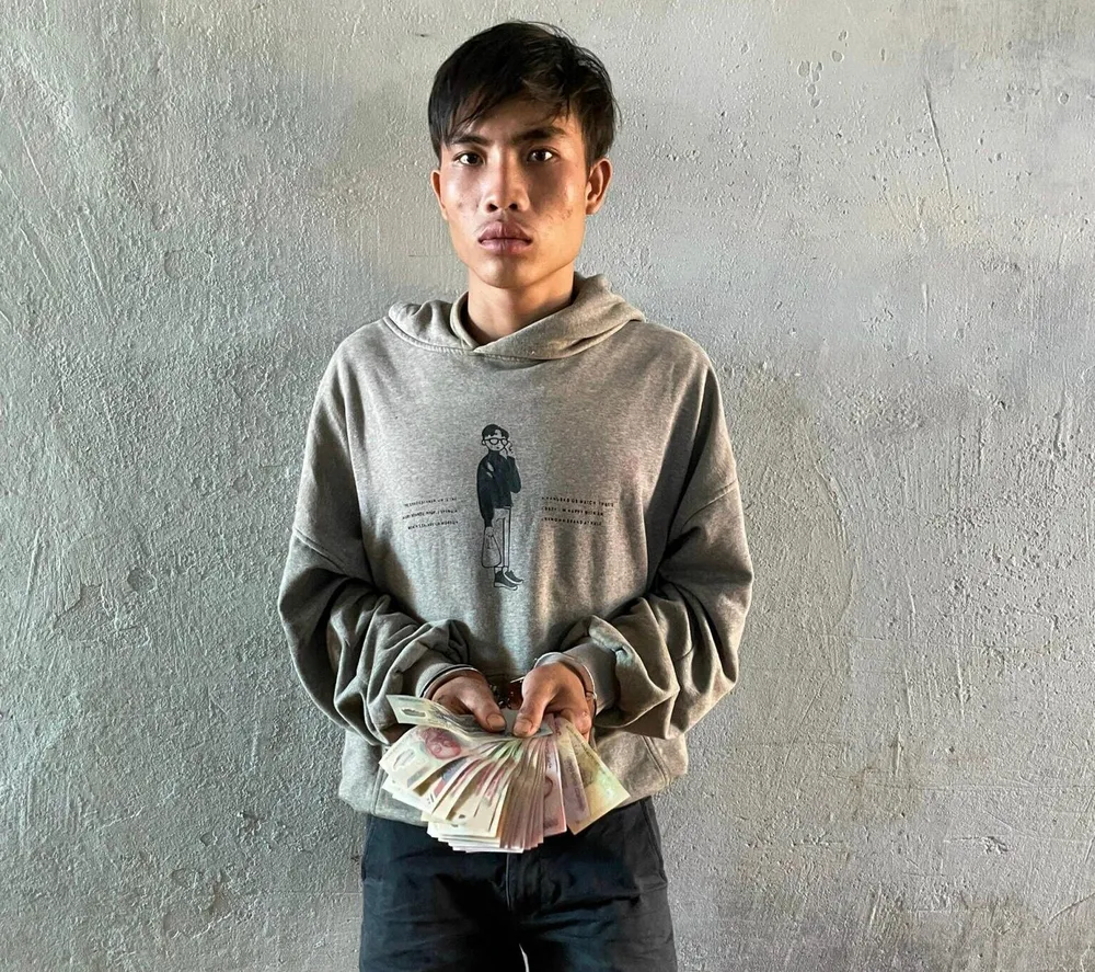 Lù Văn Biều tại cơ quan công an. Ảnh: LX