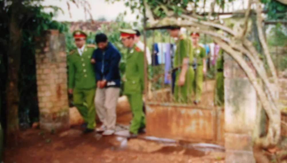 Dẫn giải Tưởng Đăng Thế thực nghiệm hiện trường. Ảnh: HSVA Dẫn giải Tưởng Đăng Thế thực nghiệm hiện trường. Ảnh: HSVA