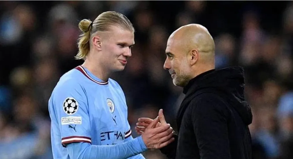 Pep Guardiola rất hài lòng vì Haaland ghi 5 bàn trong 1 trận đấu. Ảnh: AFP