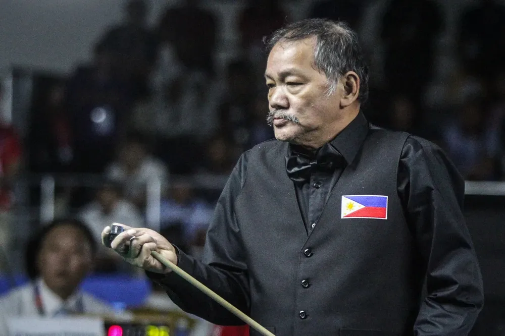 Lão ông Erfen Reyes 68 tuổi vô đối ở nội dung pool 8 và 9 bi. Ảnh: CTP