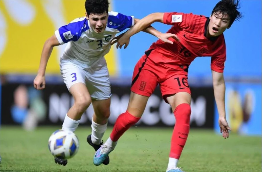 Uzbekistan thể hiện rất kín kẽ và Hàn Quốc thắng khó. Ảnh: AFC