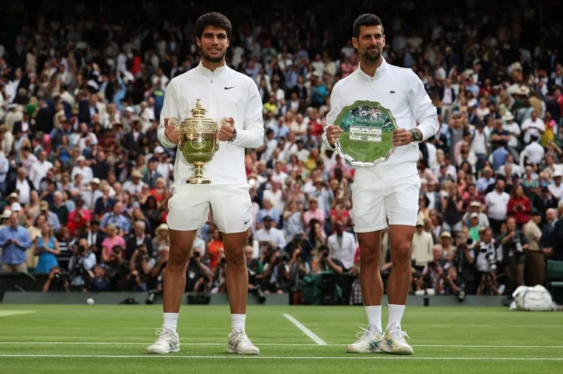 Đánh bại Djokovic 3-2 trong trận đấu gần 5 giờ, Alcaraz lần đầu lên ngôi Wimbledon. Ảnh: AFP