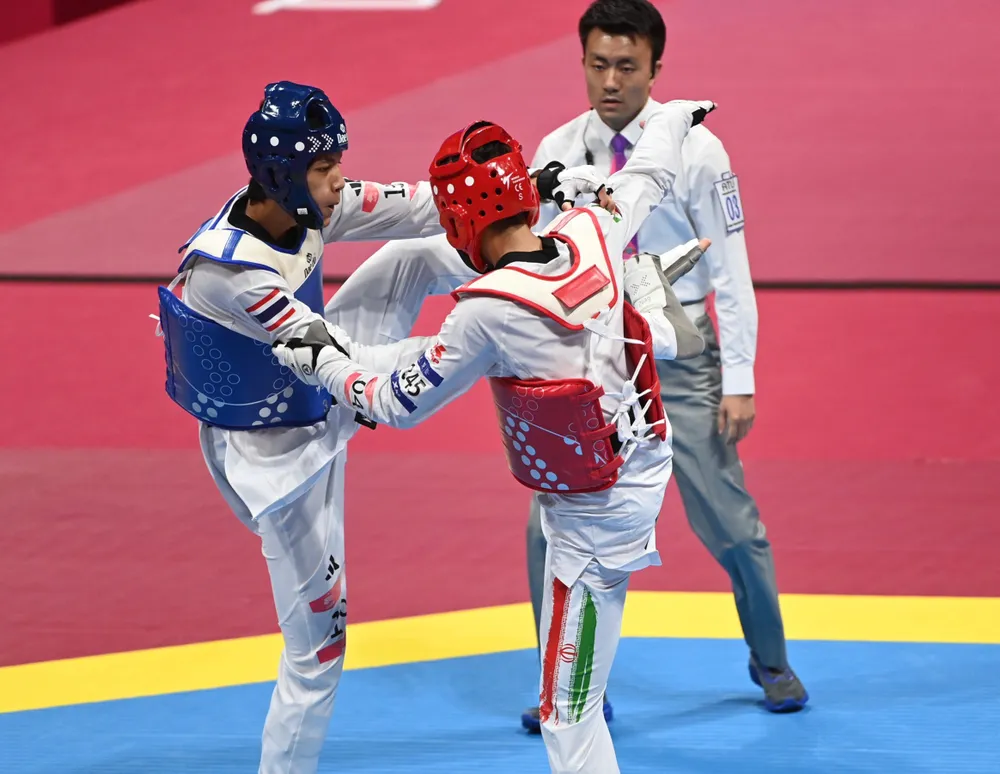 Tubtimdang Banlung đánh bại Housseinpour Alizera của Iran 2-0 ở chung kết hạng 63kg nam để mang về tấm HCV thứ hai cho thể thao Thái Lan. Ảnh: CTP Thai-1.jpg