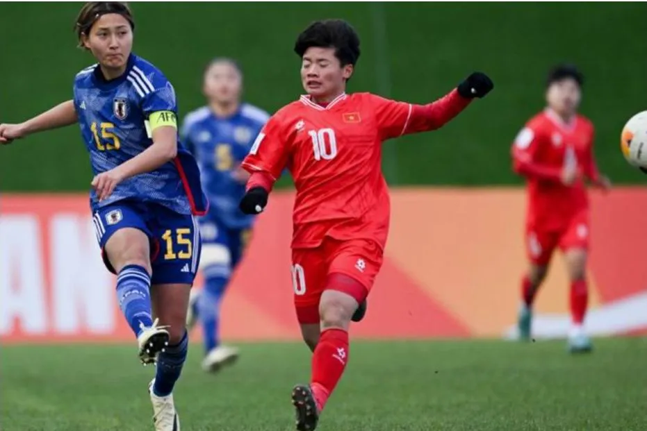 ...Và trong trận thua Nhật Bản 0-10. Ảnh: AFC Japan-Vietnam-1.jpg