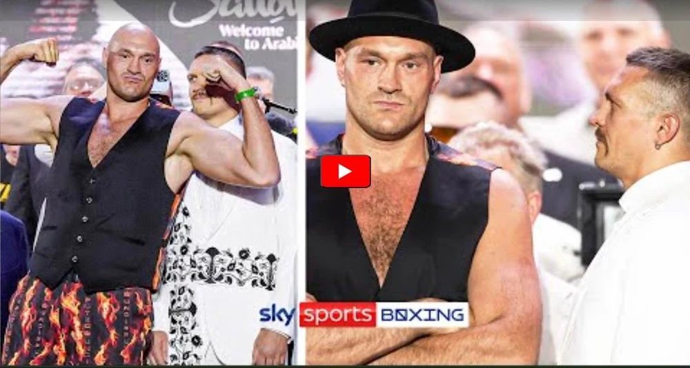 Tyson Fury (áo đen) không nhìn Usyk vì trông như...."công tử bột". Ảnh: EPA Tyson.jpg