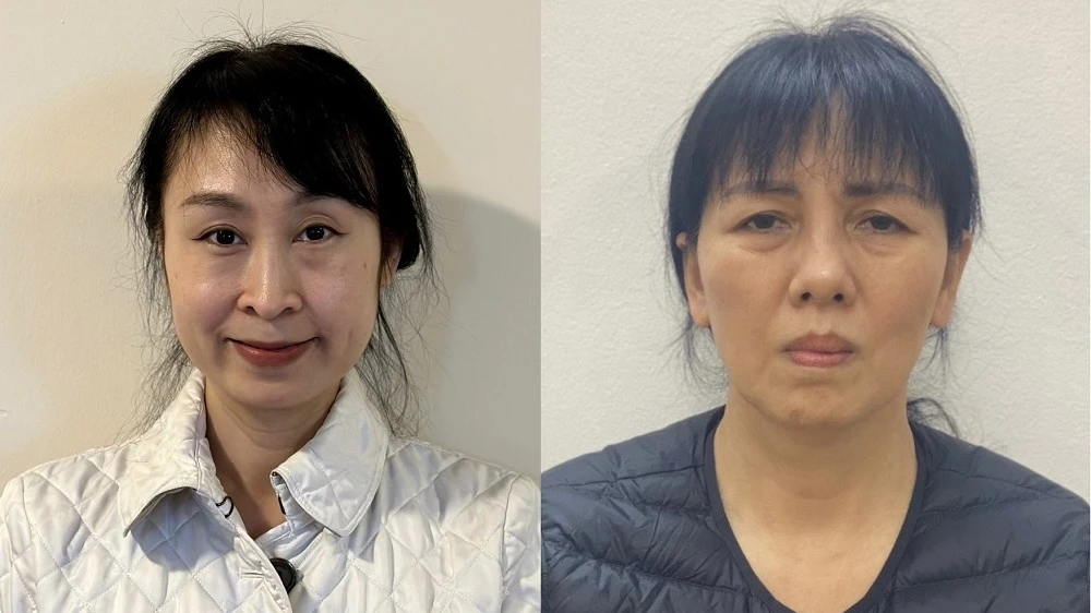 Hai bị can Nguyễn Thị Thanh Thủy (trái) và Nguyễn Bạch Thùy Linh