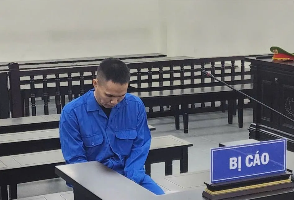 Bị cáo tại phiên tòa. Ảnh: T.T phóng hỏa đốt nhà.jpg