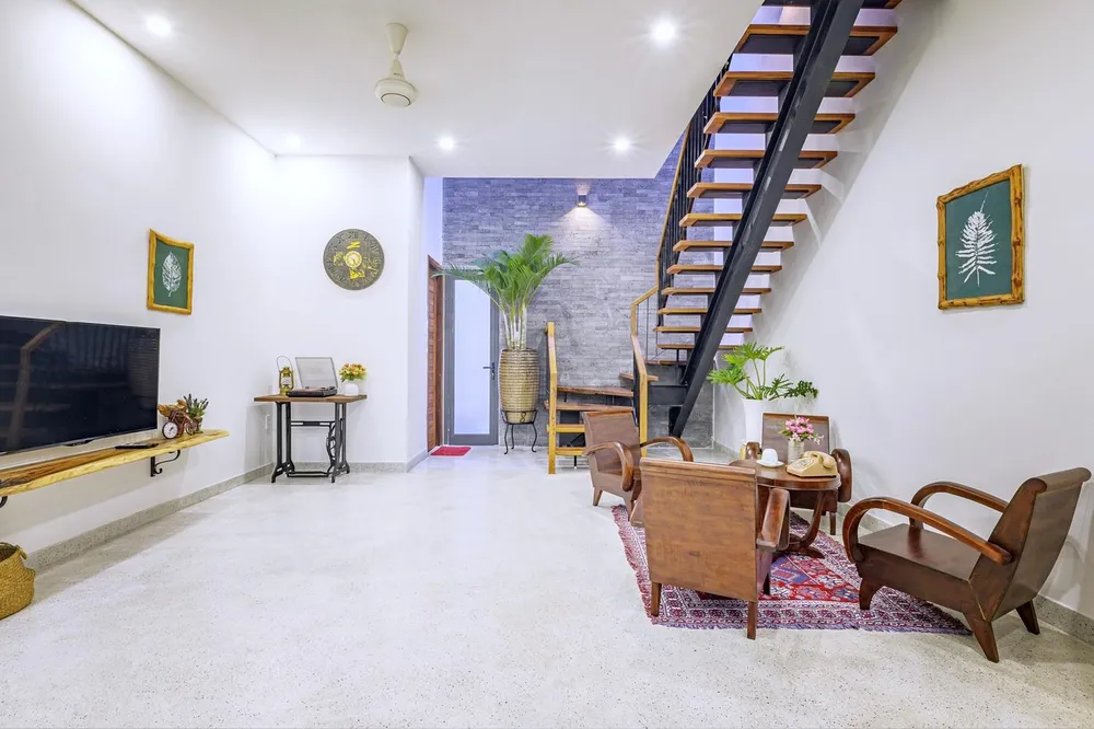 Kiến trúc sư Nhà của gió - Green Concept thiết kế ngôi nhà gồm ba phòng ngủ, phòng khách, bếp và sân chơi nhỏ.