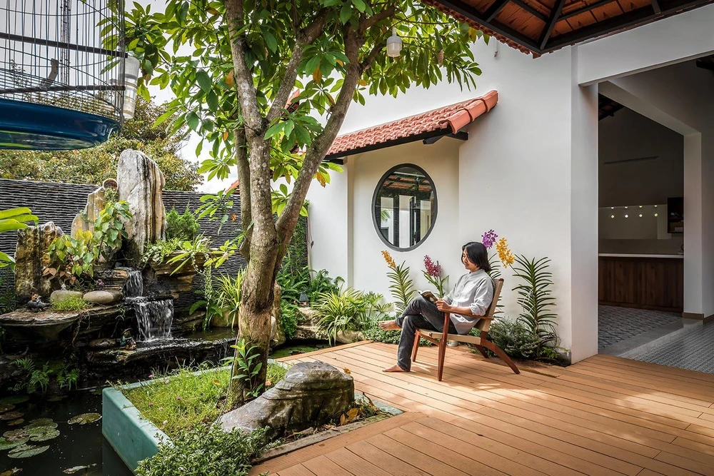 Không gian sống bình yên, chan hòa với thiên nhiên được hình thành từ mong ước của gia chủ và sự tâm huyết của nhóm thiết kế.