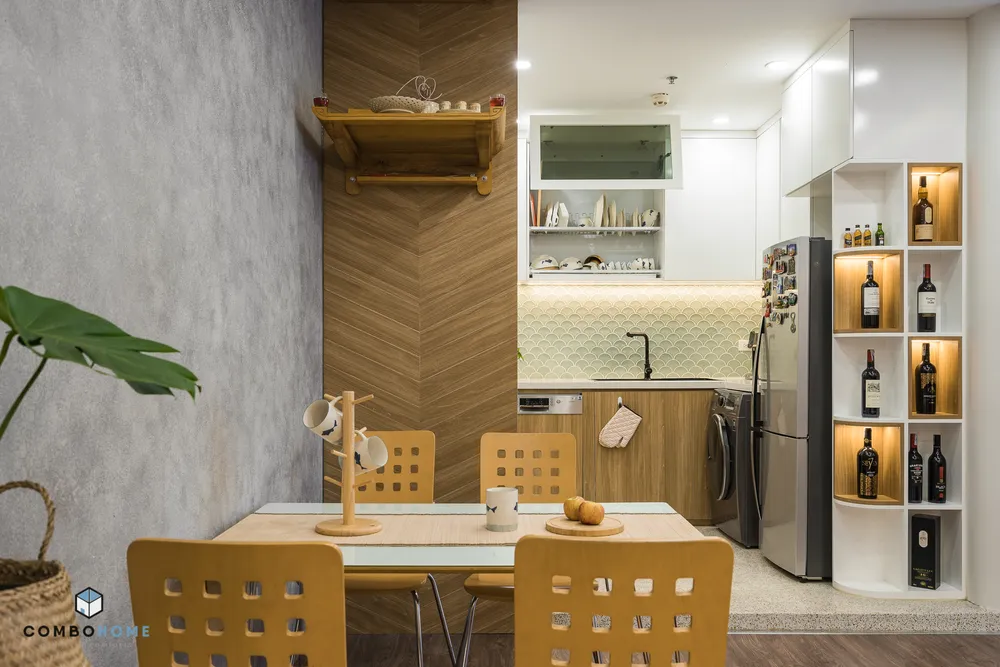 Căn hộ sử dụng tông màu trắng kết hợp vàng gỗ để tạo nên vẻ đẹp sang trọng, thanh lịch và ấm áp.