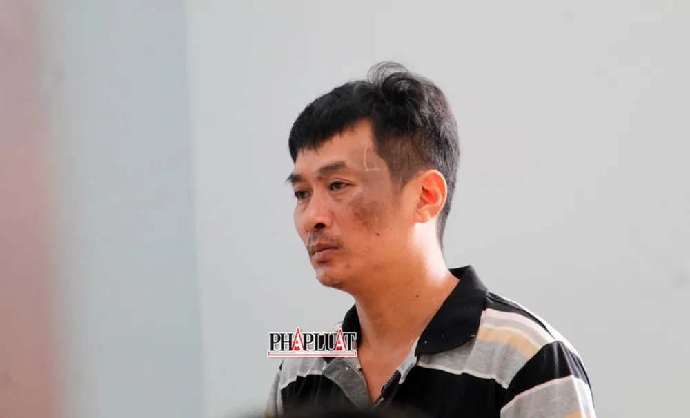 Bị cáo Lê Văn Nhóc tại tòa ngày 21-6. Ảnh: NHẪN NAM