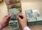 Đồng loạt giảm mạnh lãi suất tiền gửi tiết kiệm, cho vay ảnh 1 Mỹ không hạ lãi suất, tiền Việt thời gian tới sẽ ra sao?