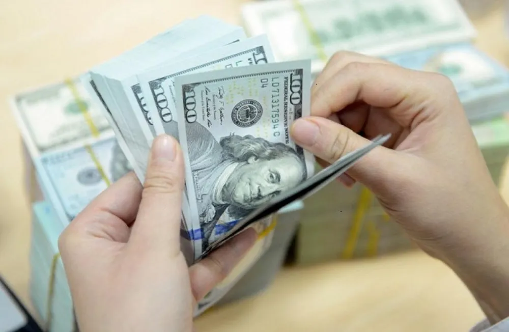 Giá USD điều chỉnh giảm trong ngắn hạn. Ảnh minh hoạ Giá USD tại các ngân hàng tăng cao