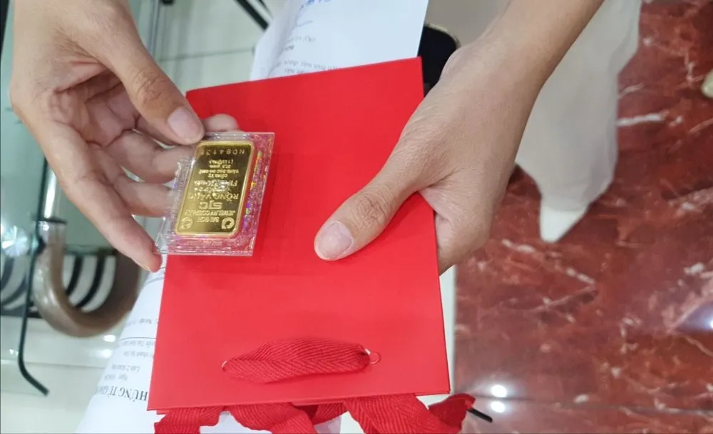 mua vang_miếng.jpg