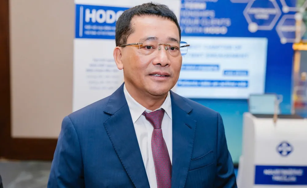 Ông Lê Văn Quảng, Giám đốc Bệnh viện K (Hà Nội) trao đổi với báo chí bên lề hội thảo. Ảnh: TT ong le van quang giam doc benh vien k.jpg