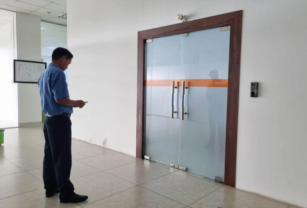 Sáng 22-11, văn phòng Công ty Tài chính TNHH MTV Mirae Asset (Công ty Mirae Asset, đường Nguyễn Văn Trỗi, TP Tam Kỳ, Quảng Nam) đóng cửa. Ảnh: TN