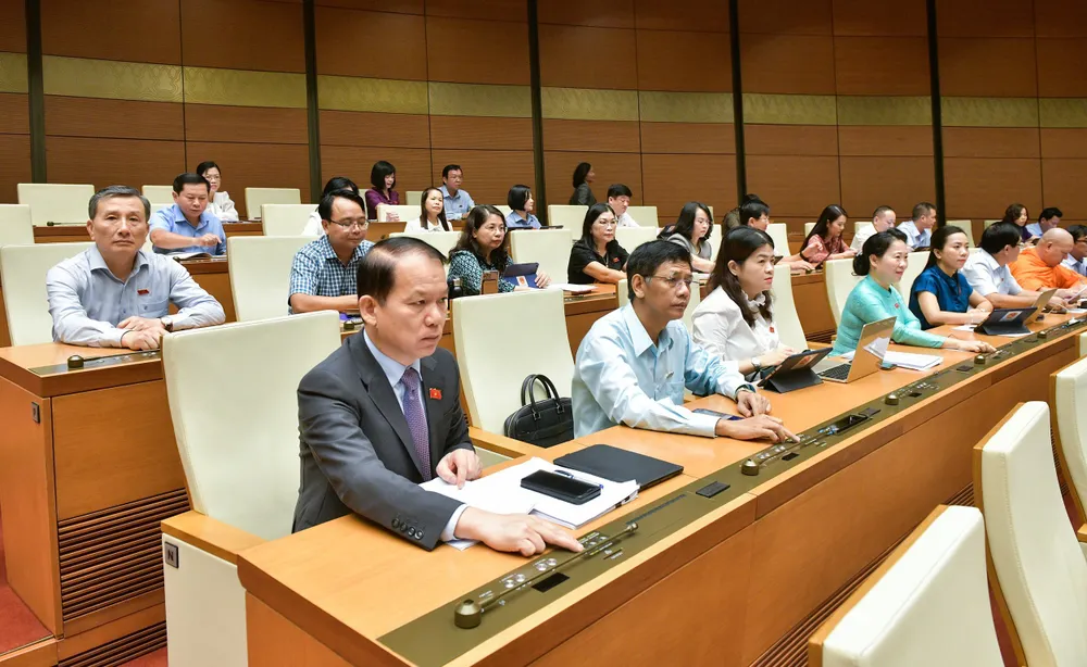 Quốc hội biểu quyết thông qua Luật Lưu trữ (sửa đổi) thong_qua-luat-bi-mat-nha-nuoc.jpg
