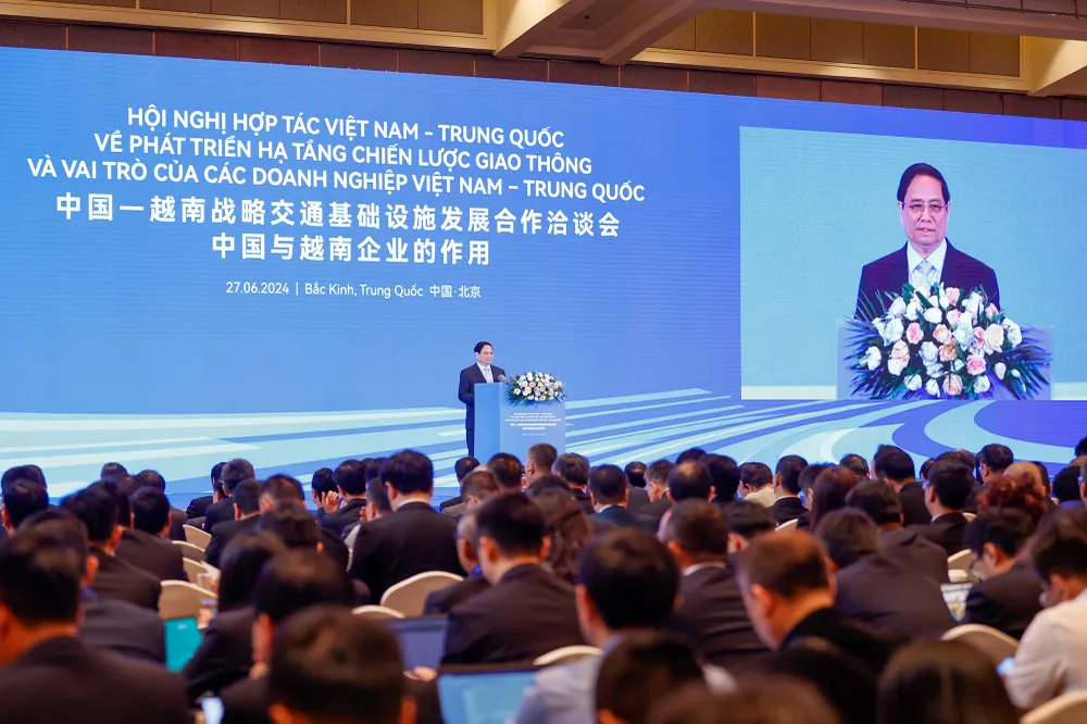 Thủ tướng Phạm Minh Chính dự Hội nghị hợp tác Việt Nam-Trung Quốc về phát triển hạ tầng chiến lược giao thông và vai trò của các doanh nghiệp Việt Nam-Trung Quốc - Ảnh: VGP/Nhật Bắc 8.jpg