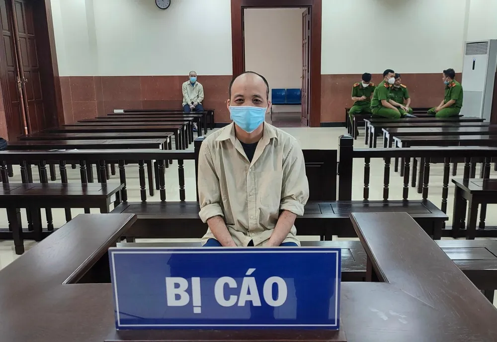 Bị cáo Nguyễn Văn Minh bị xét xử về tội lừa đảo chiếm đoạt tài sản. Ảnh NT