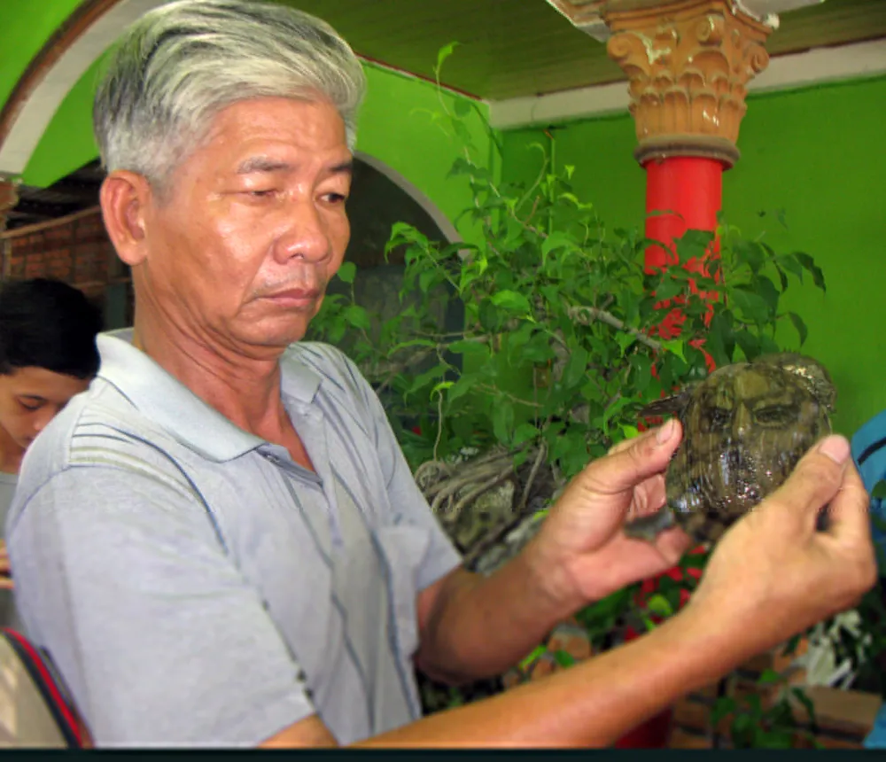 Ông Nông với con ba ba có hình y chang mặt người