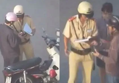 Vụ 'vạch ví người đi đường': CSGT chỉ nhận tờ rơi quảng cáo? ảnh 1 Vụ 'vạch ví người đi đường': CSGT chỉ nhận tờ rơi quảng cáo? ảnh 1