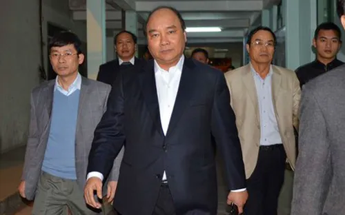 Tối 13-1, Phó Thủ tướng Nguyễn Xuân Phúc đến thăm ông Nguyễn Bá Thanh ảnh 1