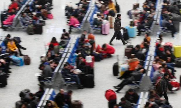 Hành khách tại nhà ga Hồng Kiều, Thượng Hải Tết Ất Mùi 2015 ở Trung Quốc có gì đặc biệt?