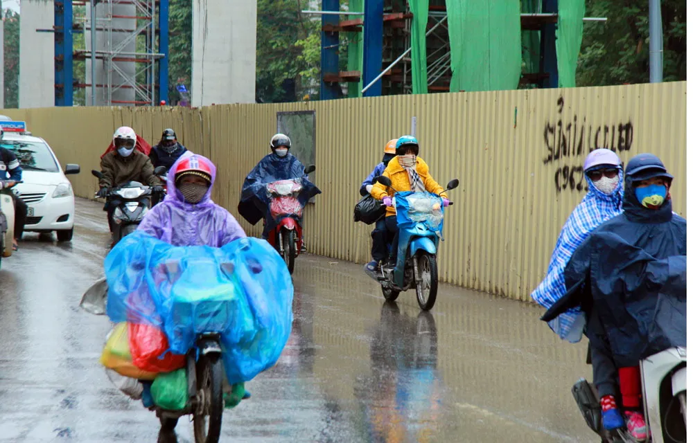 Người Hà Nội đốt lửa chống rét kỷ lục ảnh 9