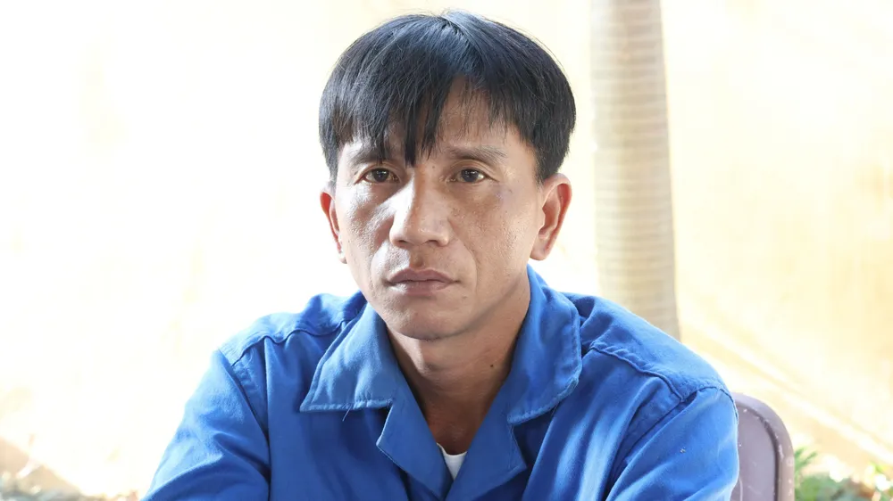 Nguyễn Minh Trung bị bắt giữ. Ảnh: VÕ TÙNG