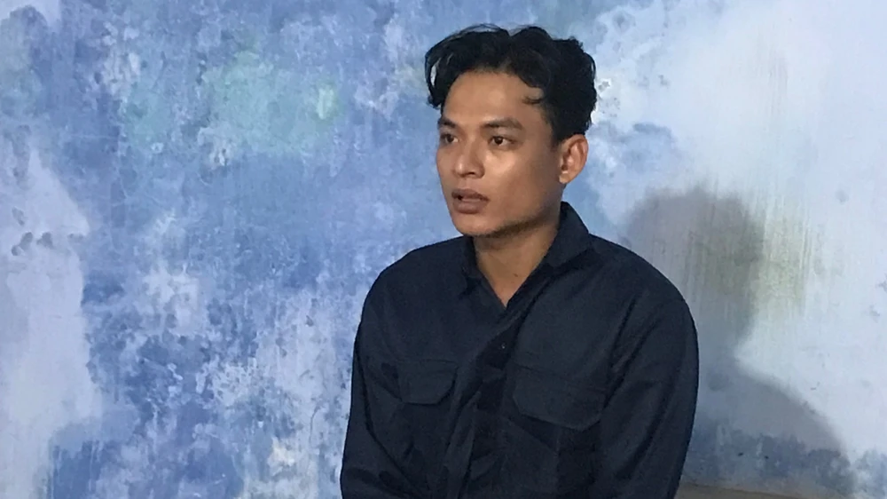 Nguyễn Tấn Hoàng Khánh bị bắt giữ. Ảnh: VÕ TÙNG