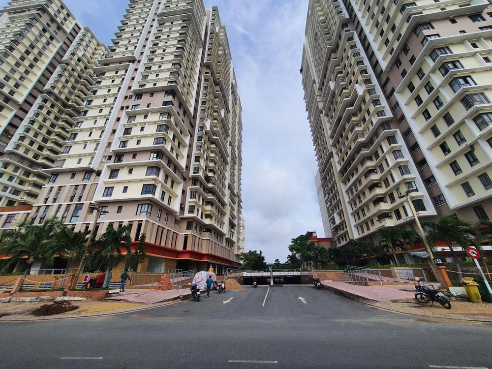 Vướng mắc thủ tục, pháp lý khiến nhiều hộ dân trong khu tái định cư Phú Mỹ, quận 7 (tp.hcm) chưa được cấp sổ hồng. Ảnh: KC