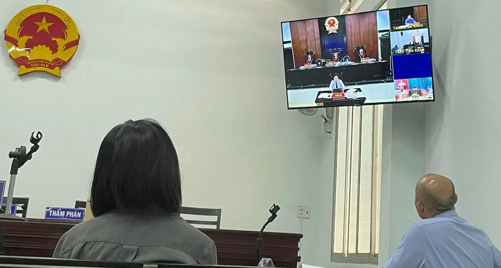 Phiên tòa phúc thẩm vụ kiện được tổ chức trực tuyến. Ảnh: NH