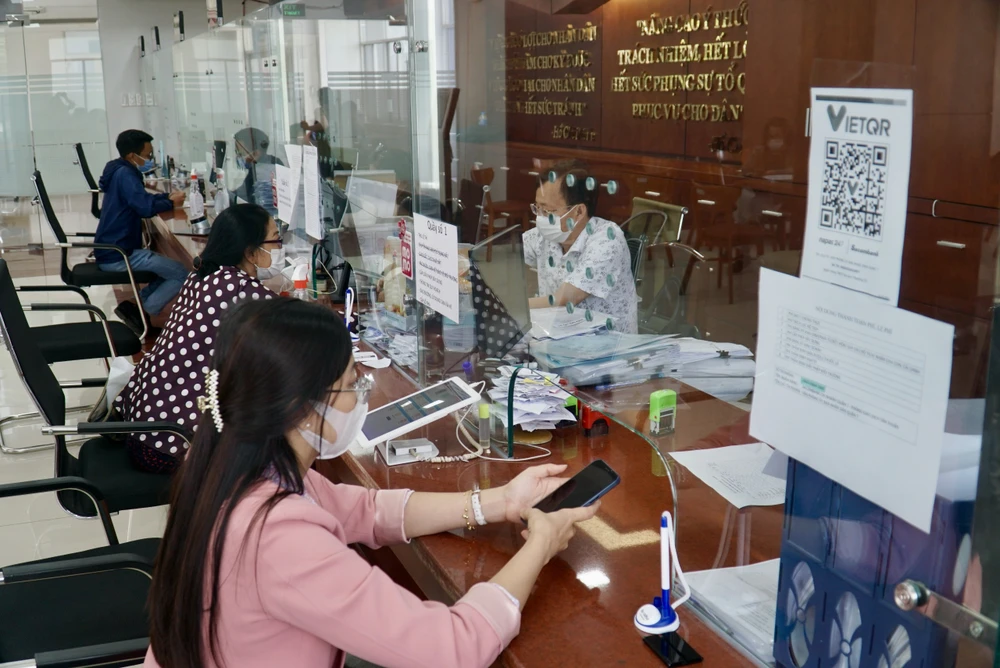 Để thực hiện hiệu quả Nghị quyết 98 đòi hỏi cả hệ thống chính trị TP phải vào cuộc, trong đó có vai trò quan trọng của người đứng đầu các cấp. Ảnh: BẢO PHƯƠNG P3-chuyen-de-anh-bai-chinh-bao-phuong.jpg